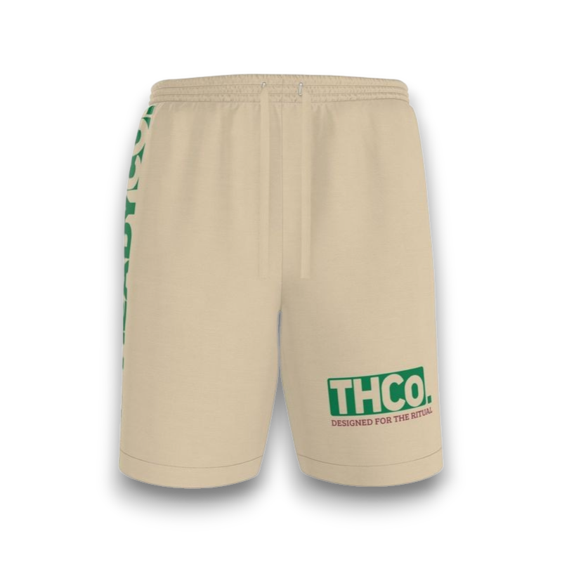 Beige shorts with green branding