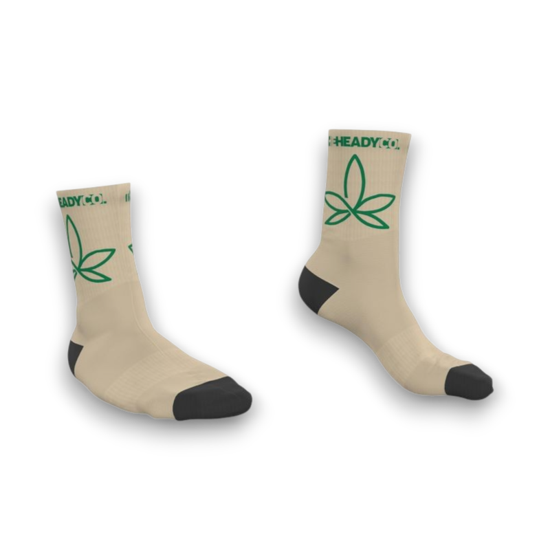 Beige socks with green leaf logo