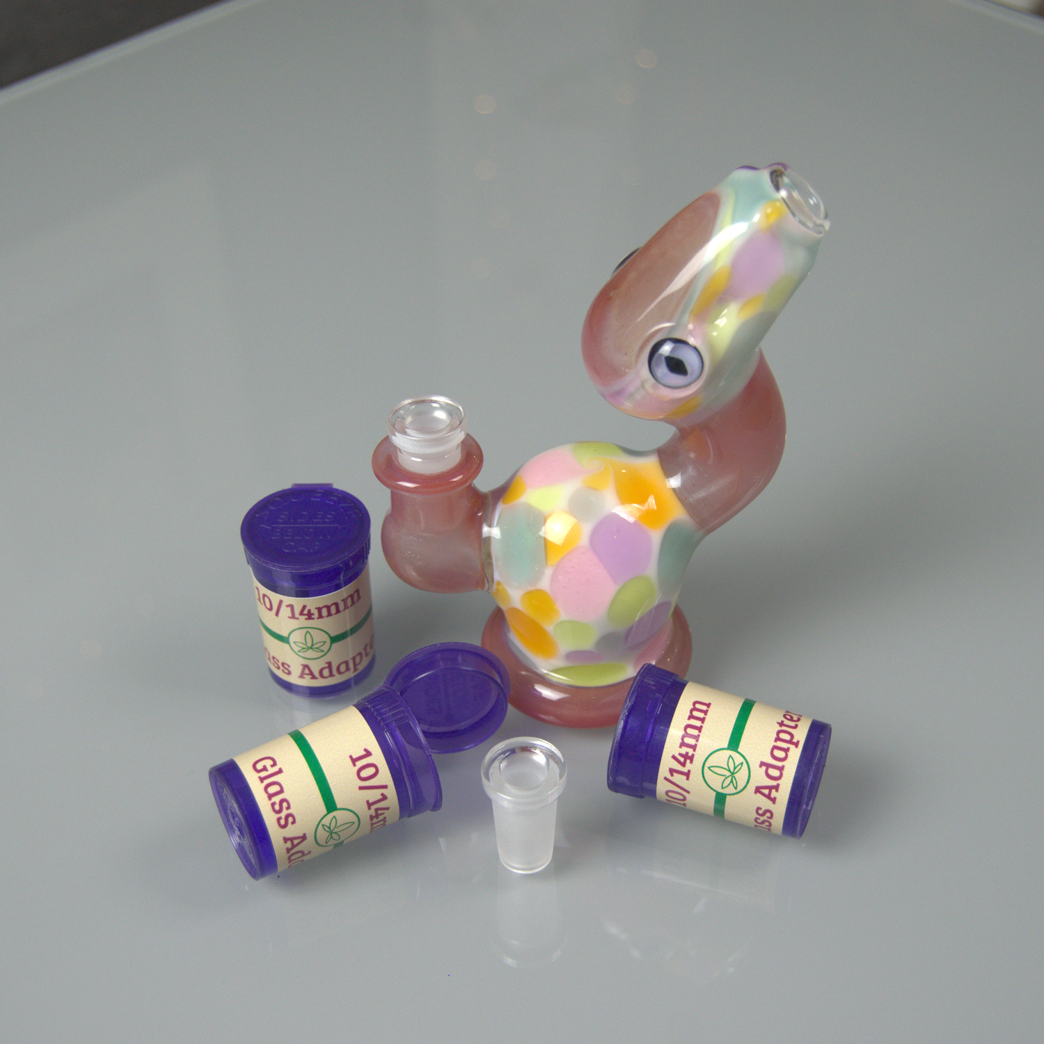 3 containers containing 10/14mm glass adapters infront of a 14mm piece that has a 10mm adapter in it