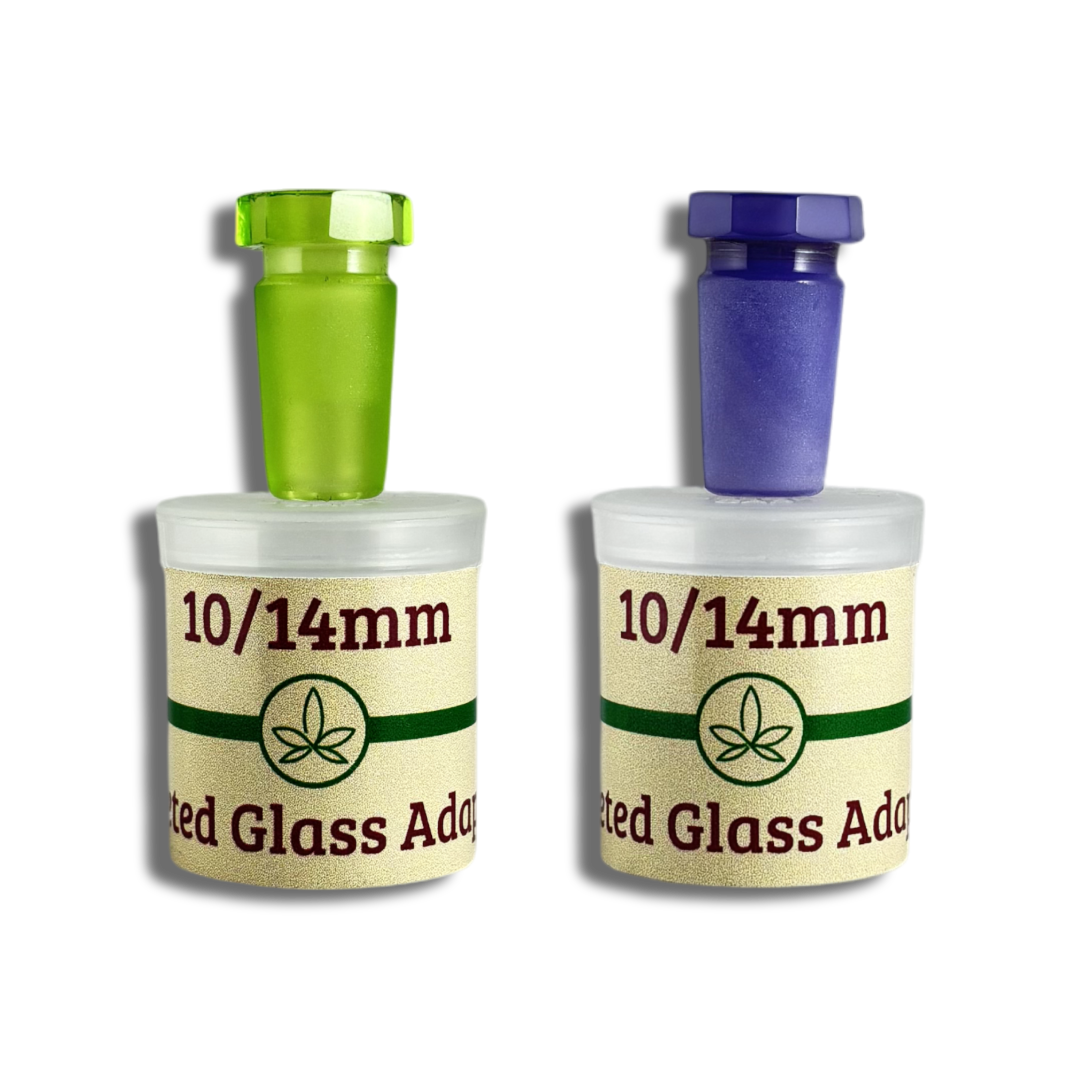 Two faceted glass adapters in Lilac and Lime Green by THCo. and their packaging
