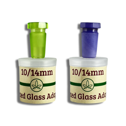 Two faceted glass adapters in Lilac and Lime Green by THCo. and their packaging