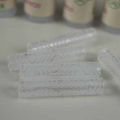 5 Clear Quartz Pillars laid out in front of their packaging