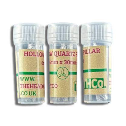 Three clear containers holding Hollow Quartz Pillars made by THCo.
