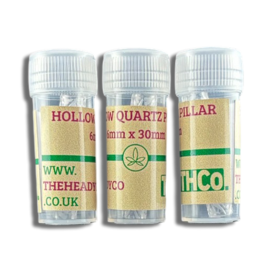 Three clear containers holding Hollow Quartz Pillars made by THCo.