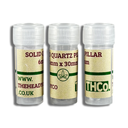 Three small containers holding 6x30mm Solid Quartz Pillars by THCo. The Heady Co.