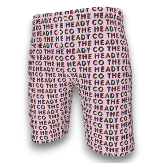 Colorful patterned shorts with 'The Heady Co' text 