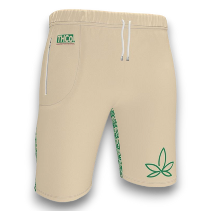 Beige shorts with green leaf logo and 'THCO' branding 