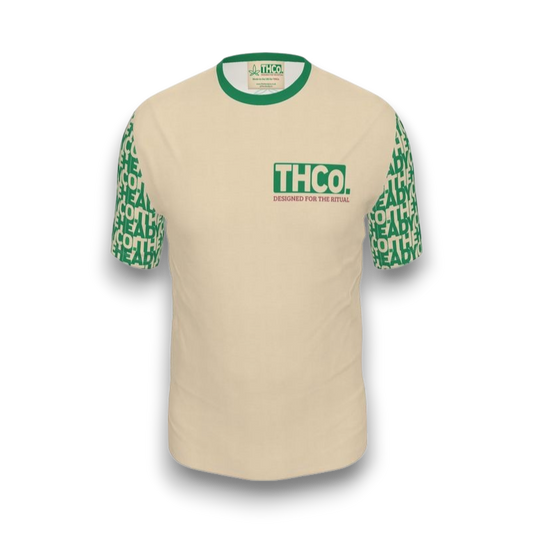 Beige t-shirt with green text and graphics