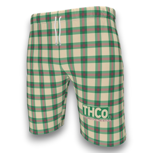 Plaid shorts with 'THCO' branding